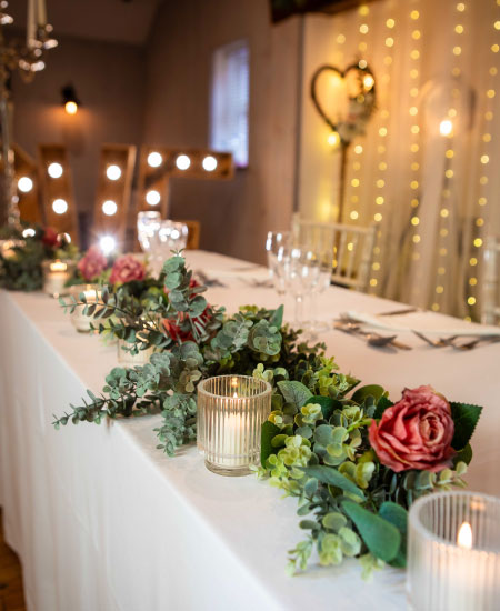 wedding table dressing flowers and candles